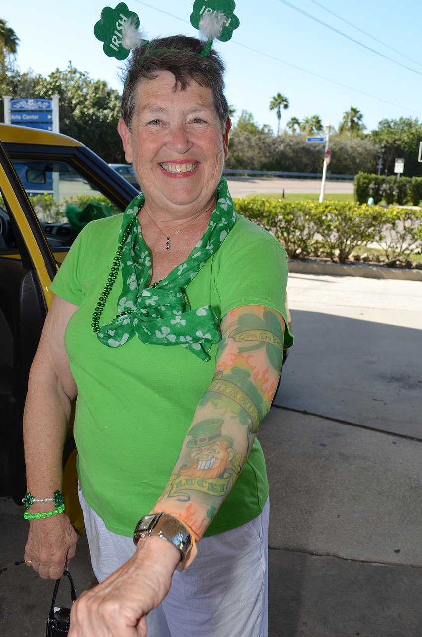 Judy Carman wore a sleeve of St. Patrick’s Day tattoos.