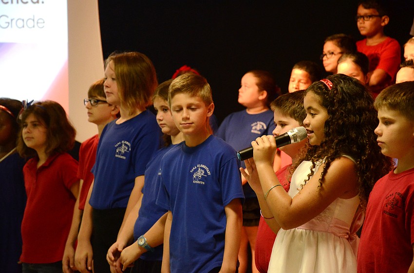 Gabrielle Phillips speaks during the program.