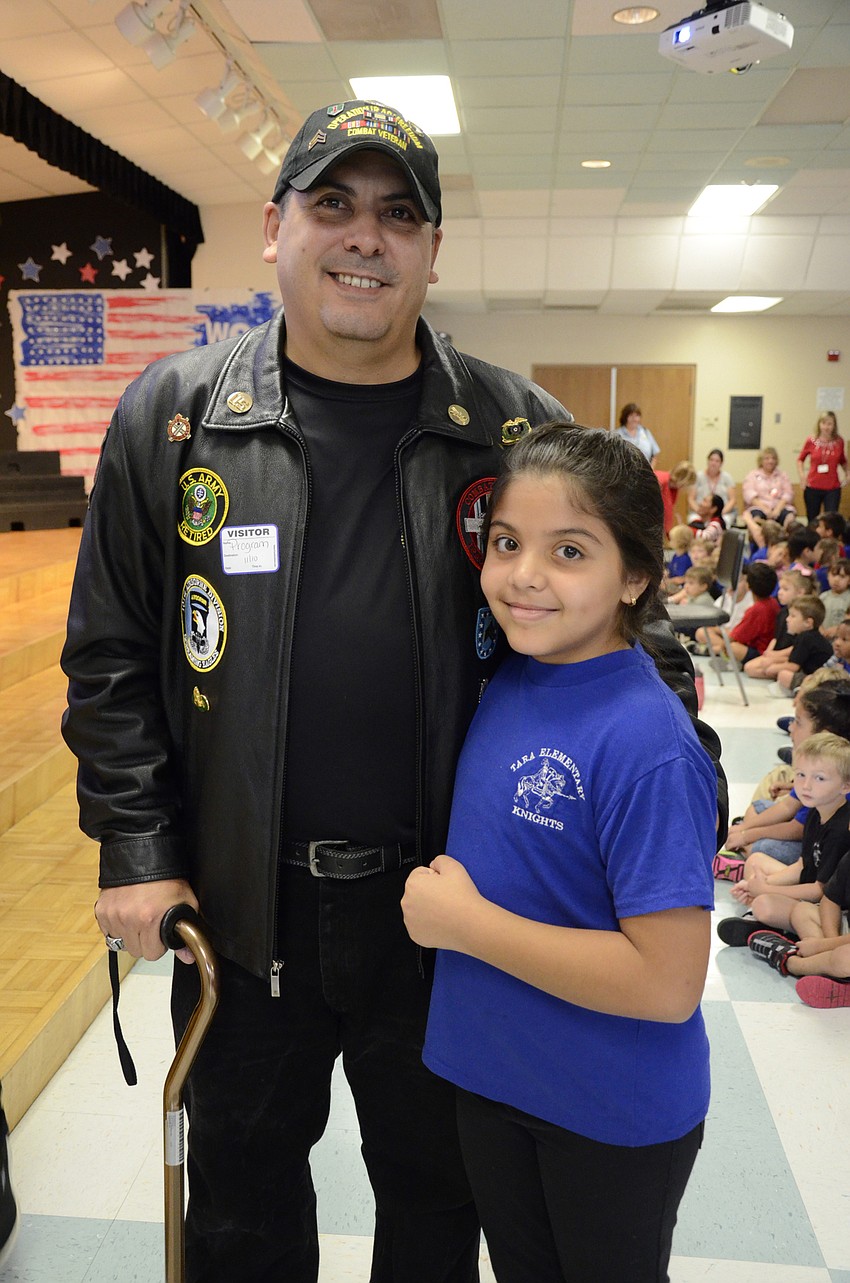 Sergeant Ricardo Rosario, a member of the 101st Airborne Division, came to watch his daughter, Natalie, at the program.