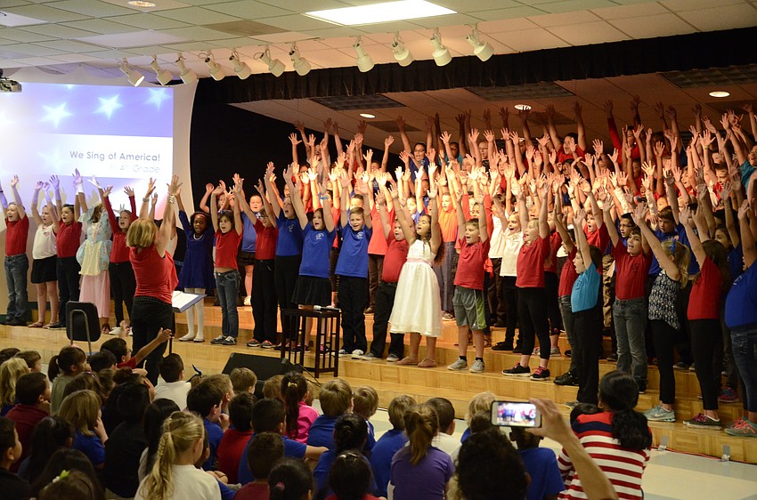 Fourth-graders sang songs and talked about patriotism during the program for family, faculty and fellow students.