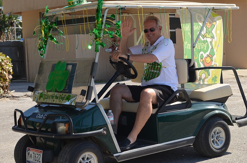 Michael Drake led the parade throughout Longbeach Village on Saturday afternoon.