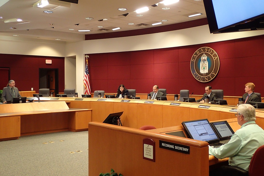 Howard Berna of Environmental Services addressed the commissioners about the proposed shelters.