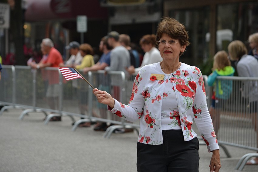 Sarasota City commissioner Susan Chapman walks in the parade.