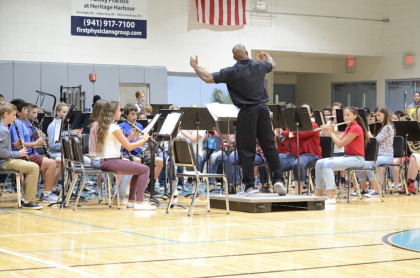 J.R. Boatwright directs the band.