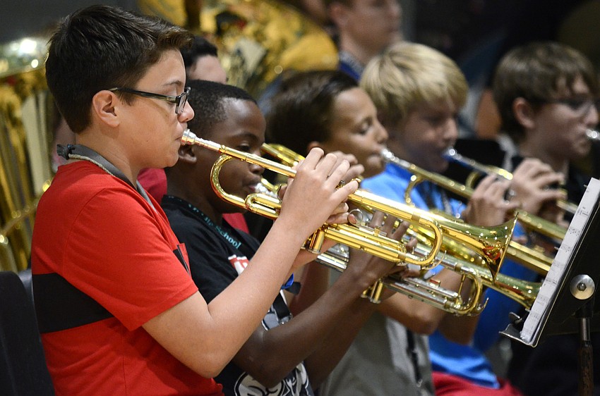 Boston Womphey plays trombone.