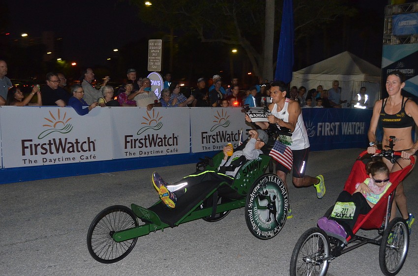 Relay runners Ricardo and Sammy Lomas with Charyse Smith and Kayla Hillard kick off the race.