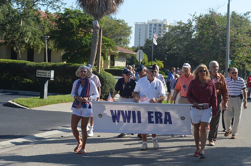 World War II era veterans march in the parade.