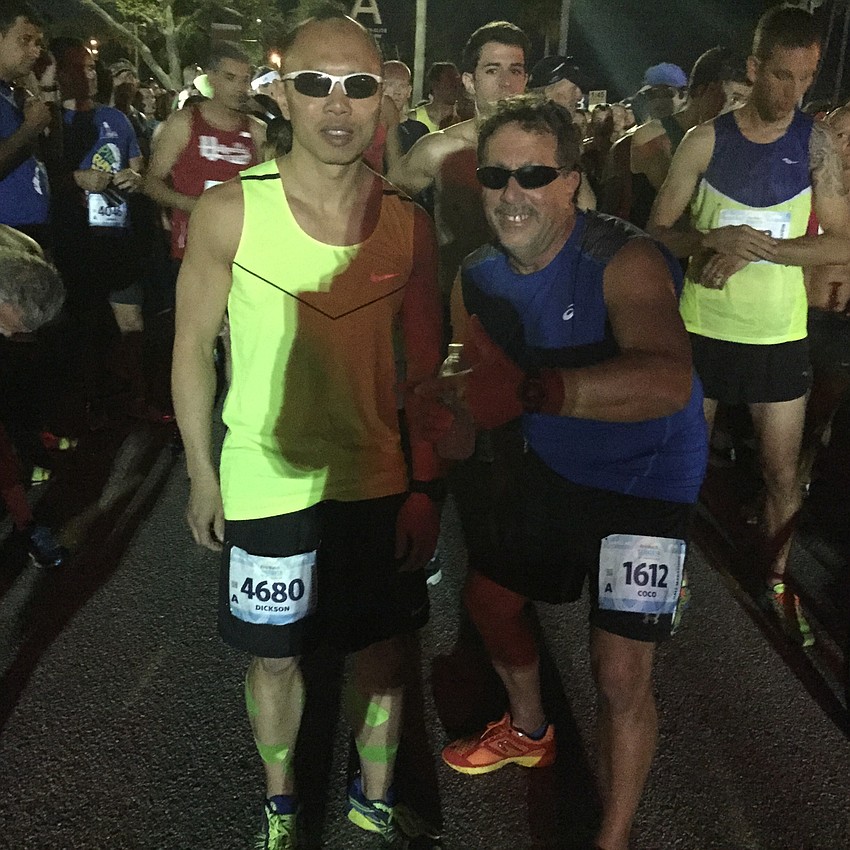 Dickson Suit and Coco Catalogne were among the first runners to cross the start line.