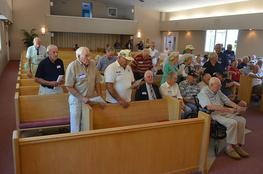 Army veterans who served before 1956 sing the former Army song.