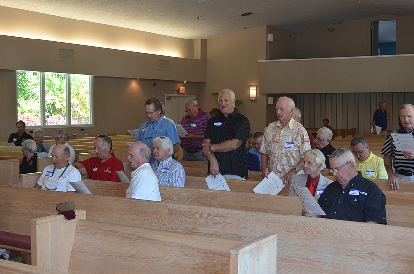 Navy veterans sing their song.