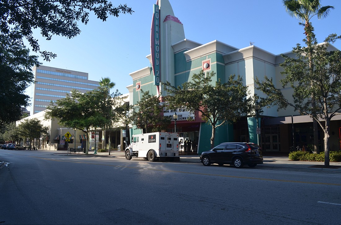 The 8.6-acre site, anchored by Regal Cinemaâ€™s Hollywood 20 theater, a YMCA branch, Kerâ€™s Wing House and others, had been owned since 2005 by Connecticut-based Paragon Realty Group LLC. Paragon paid $40 million for the 1991 Main St. property.