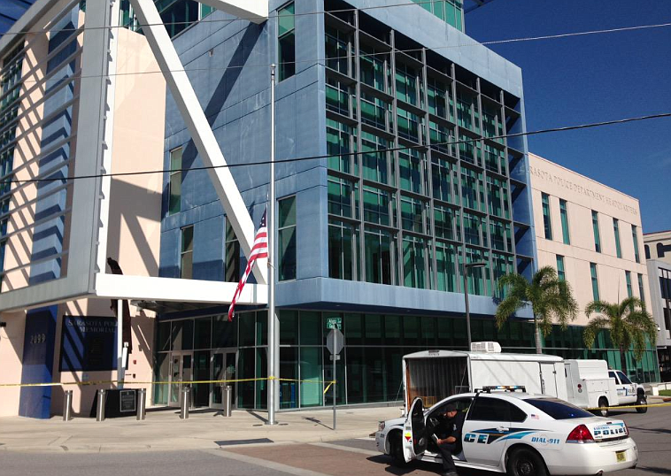 (Photo courtesy SPD)The Sarasota Police  Department headquarters was evacuated after an officer found a suspicious package Monday.