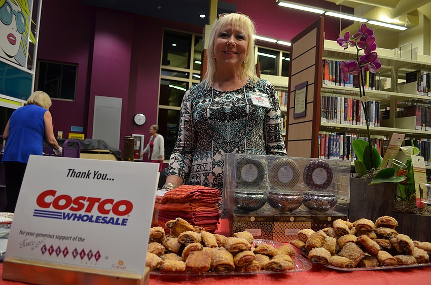 Amy Heroux serves raspberry and chocolate rugelach from Costco for dessert.
