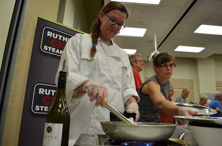 Tanya Kutchara cooks up fresh barbecued shrimp from Ruth's Chris Steakhouse.