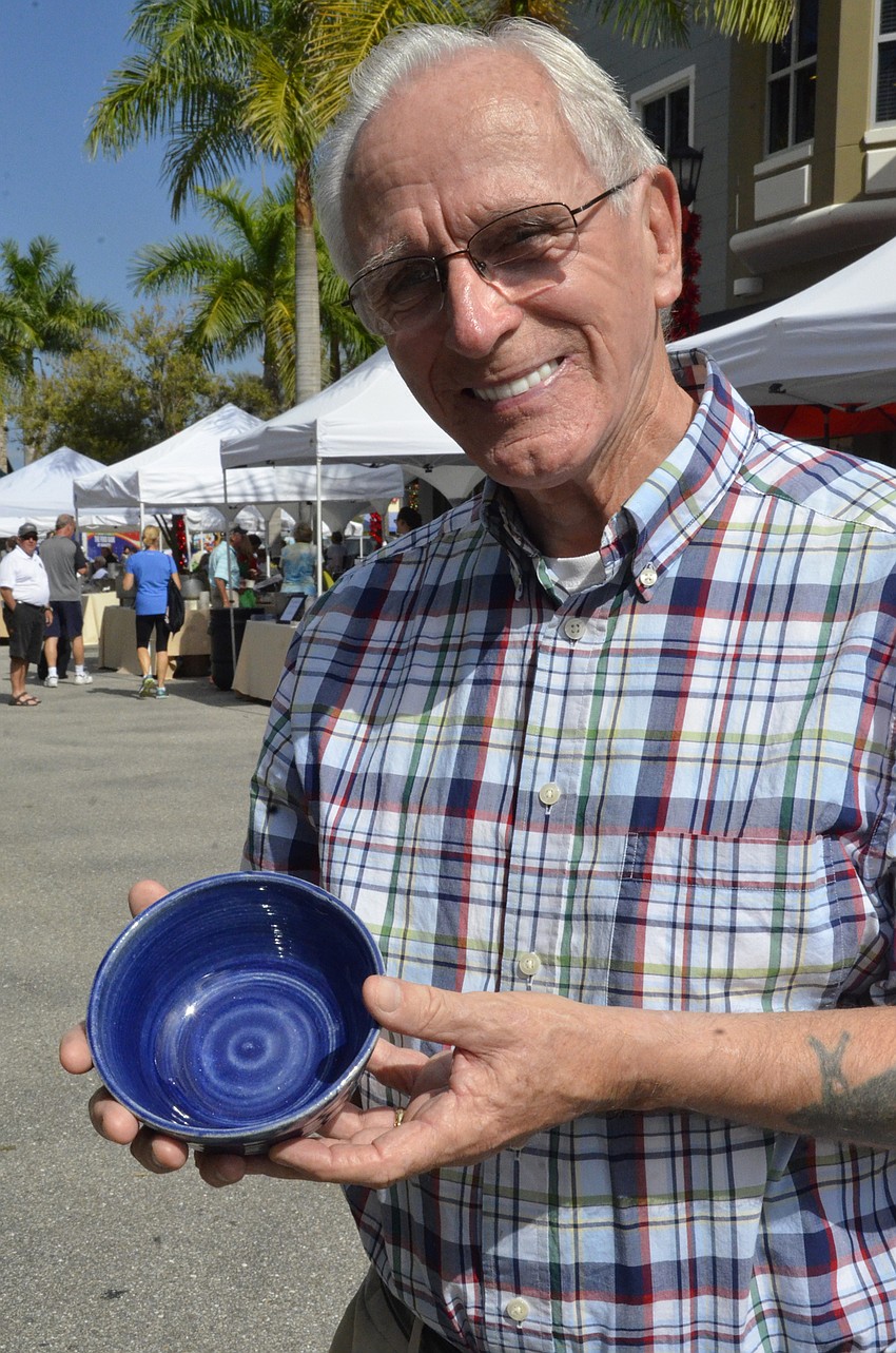 Bill Marvin of Bradenton proudly displays his bowl selection.