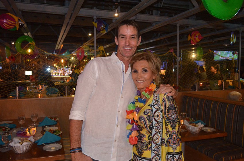 Daiquiri Deck owner Russell Matthes and Elisa Matthes, president of Sarasota in Defense of Animals