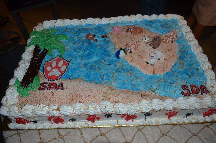 Guests enjoyed an animal-themed cake.