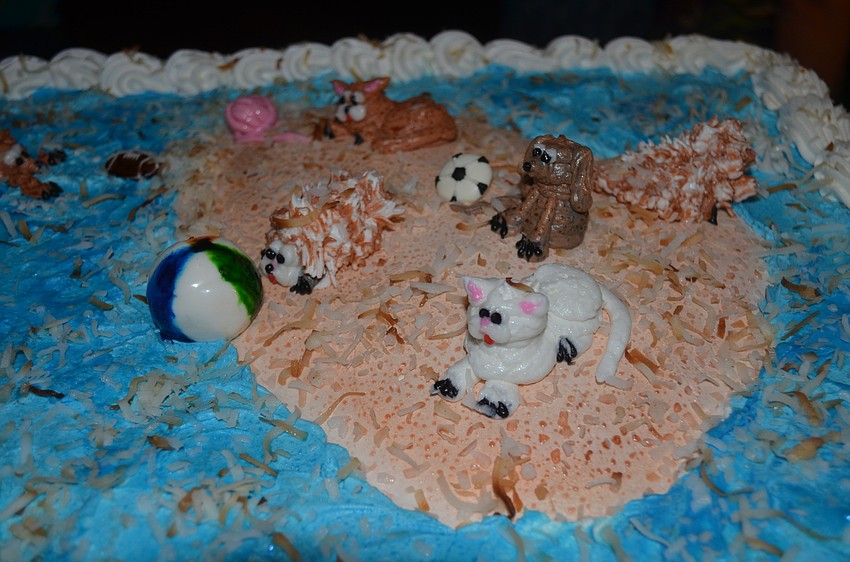 Guests enjoyed an animal-themed cake.