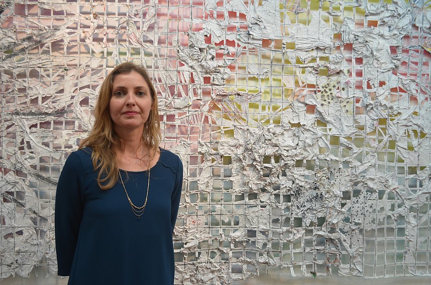 Artist Cindy Mason with “Aggrandize Grid IV”