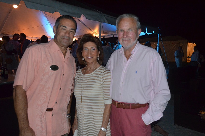 Longboat Key Club General Manager Jeff Mayers with Carol and Marshall Bellow