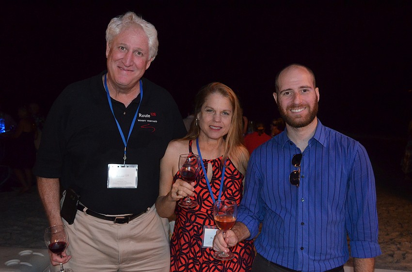 Tom and Twyla Fuchs, of Route 128 Winery and Vineyards in Sonoma, Calif., and Daniel Weber, of Johnson Brothers Liquor Co.