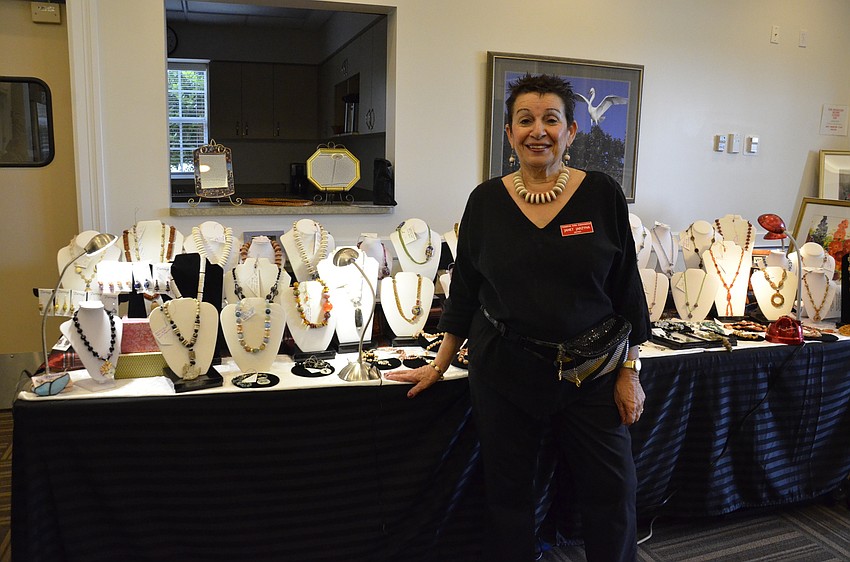 Janet Jarzyna, vice president, with her handcrafted jewelry business, 