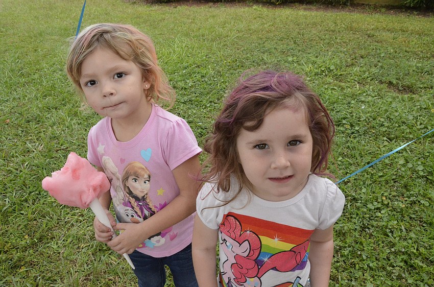 Marly Hill and Jaclyn McNeal got their hair temporarily dyed at a booth.