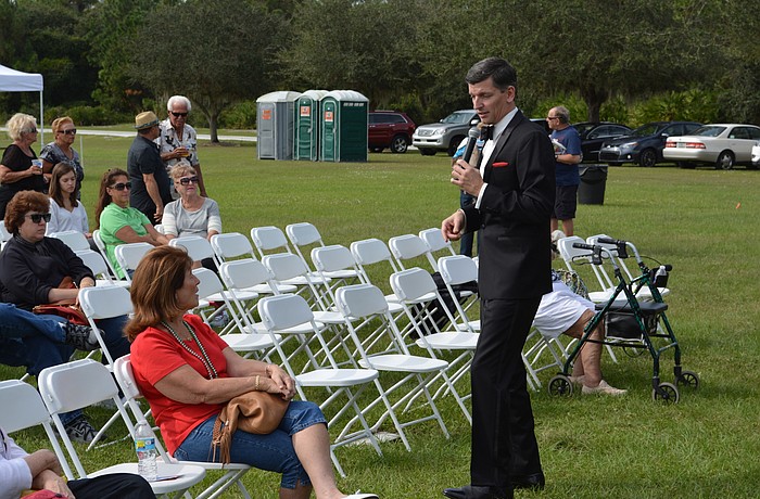 Patrick Tobin, who does a Frank Sinatra Tribute, croons to Jeanette DeRasmo of Lakewood Ranch.