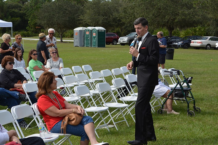 Patrick Tobin, who does a Frank Sinatra Tribute, croons to Jeanette DeRasmo of Lakewood Ranch.