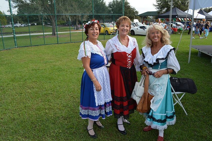 St. Petersburg's Francine Campanello, Rosalie Gallina and Marty Lentz take a break before performing with the Italian Tarantella Dancers at Festa Italiana on Saturday.