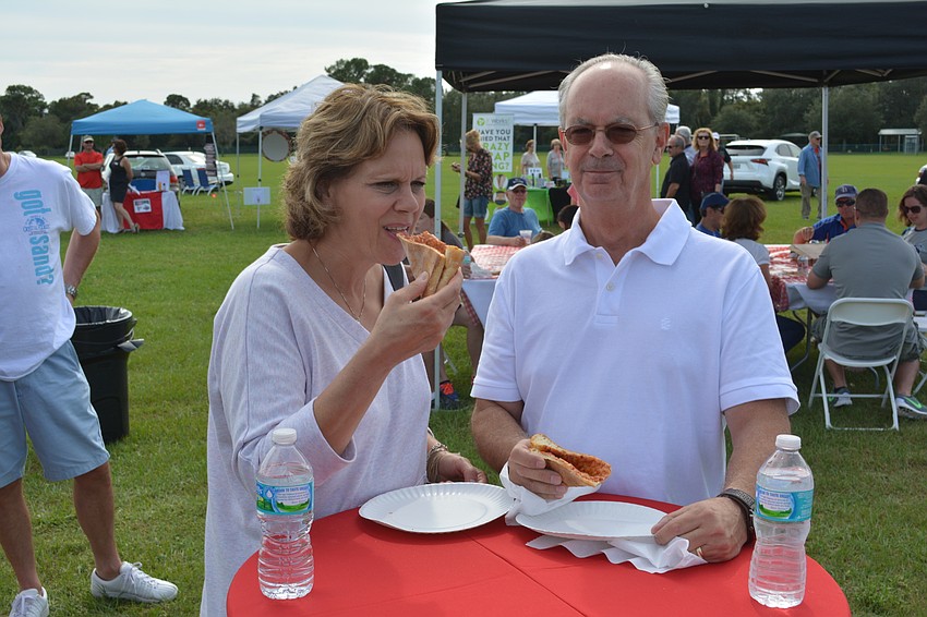 Mary Pat McSherry and Dennis McSherry of Lakewood Ranch enjoy pizza on Saturday at Festa Italiana in Greenbrook.
