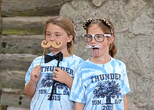 Alexa Gettel and Sami Fox make their silliest faces for a photo booth.