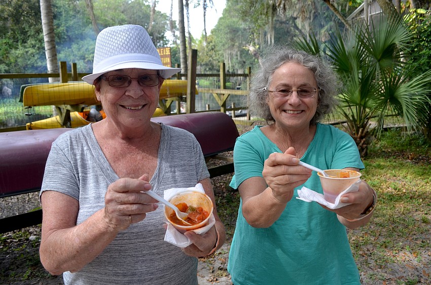 Cathy Rice and Judy Buonomano, of Bradenton, sample gumbo.