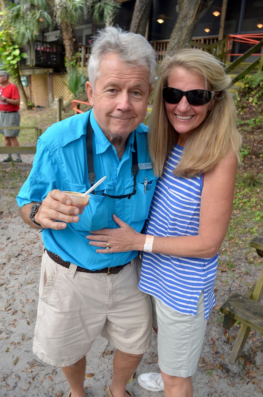 John and Becky Dubowik, of Bradenton, enjoy a breezy afternoon and hot gumbo.