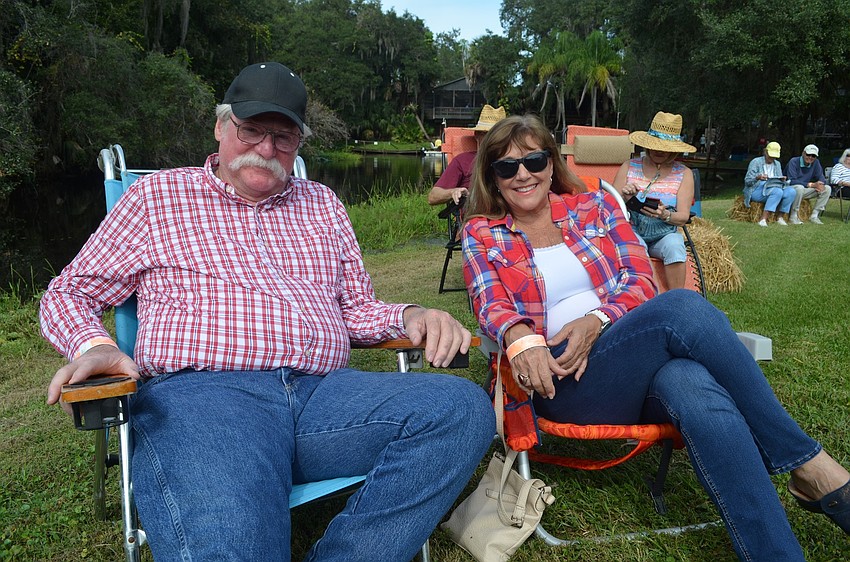 Bill and Diane McCall, of Bradenton, enjoy the show from the lawn.