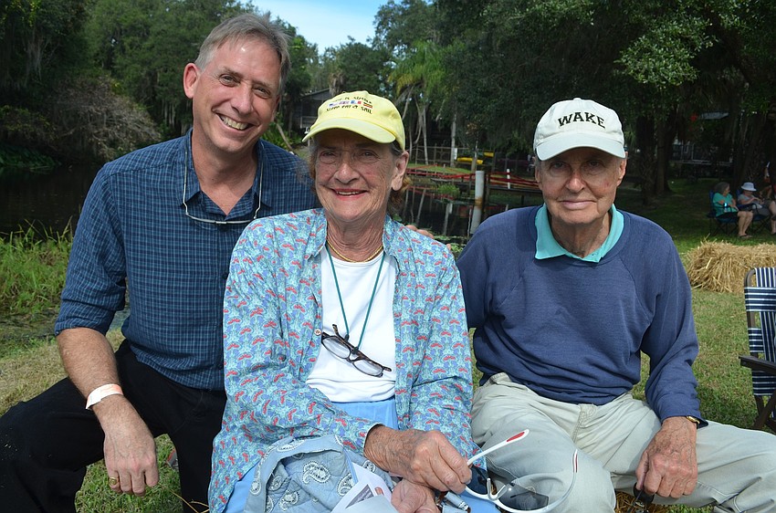 Andrew Hitchcock, of Greensboro, N.C., enjoys live music with Robin and Henry Hatch, of Englewood.