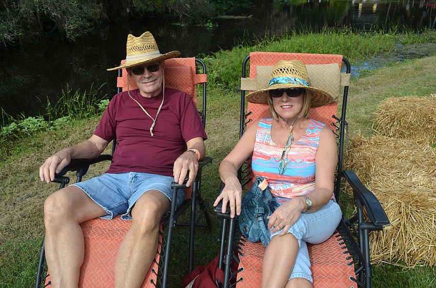 Chuck and Barbara Mitchell, of Bradenton, relax in their lawn chairs.