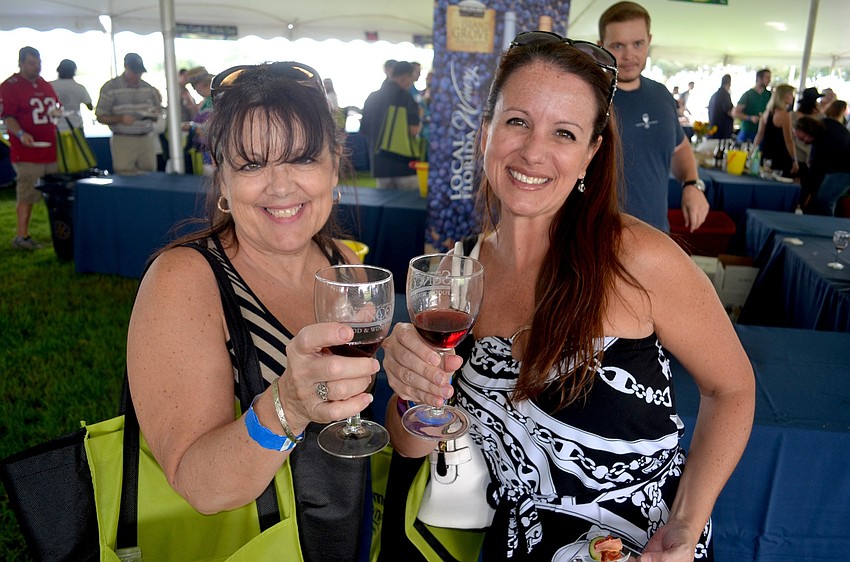 Mother-daughter duo Rosanne and Selina Ray toast to a good time.