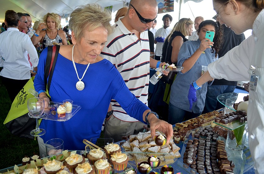Anna McBride, of Germany, samples sweet treats.