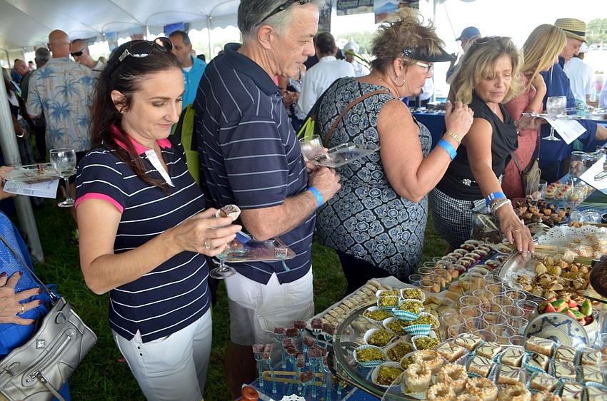 Lakewood Ranch resident Andrew Keusch decides which type of dessert she'd like.