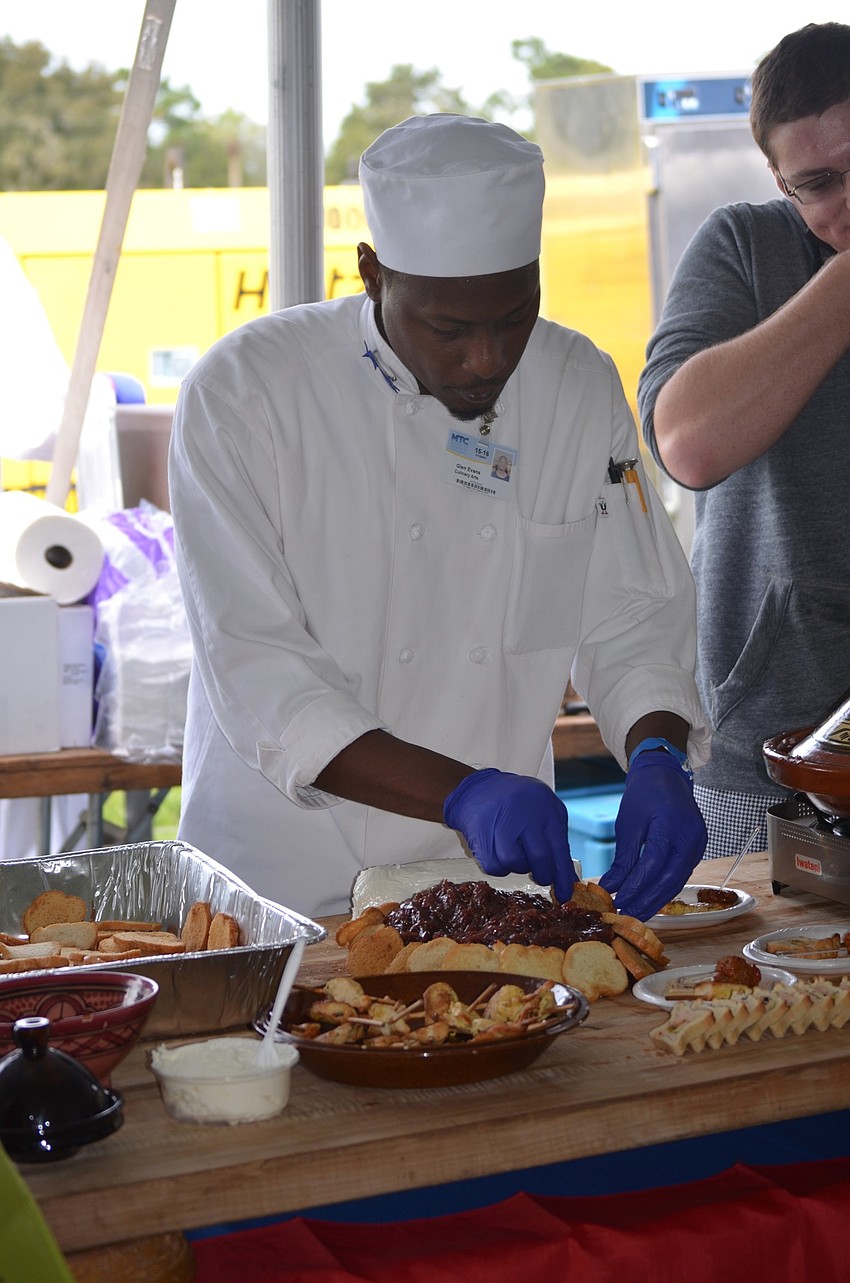 Manatee Technical College culinary student Glen Evans, of Bradenton, arranges an appetizer.