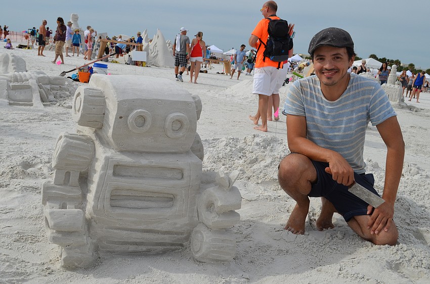 Tim Searfross next to his Robot Romance creation for the Amateur Competition.
