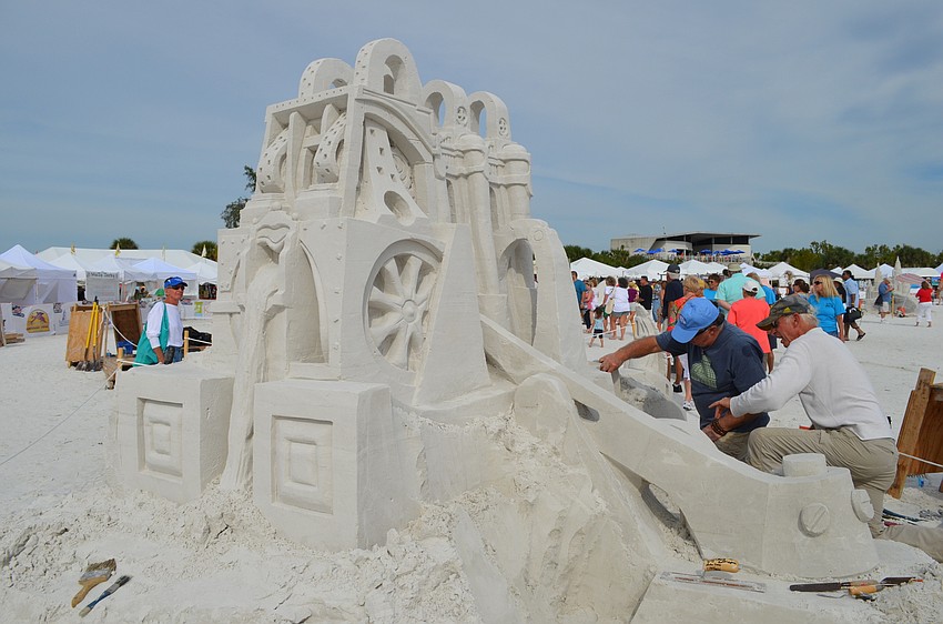 Matt Long and Kirk Rademaker work on plot 4.