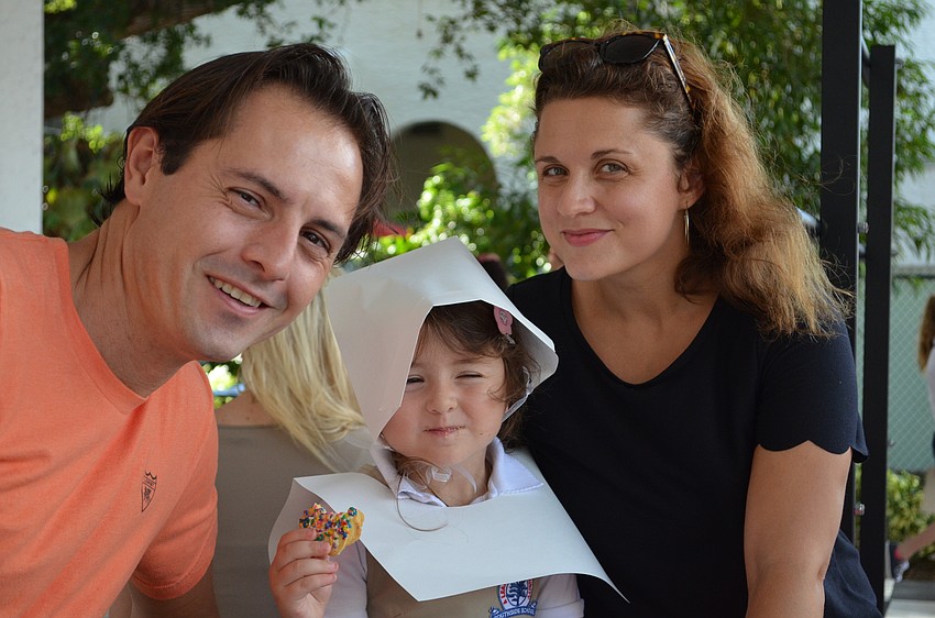 Mehdy, Sofia and Domenica Karbid enjoy some sweets following the performance.