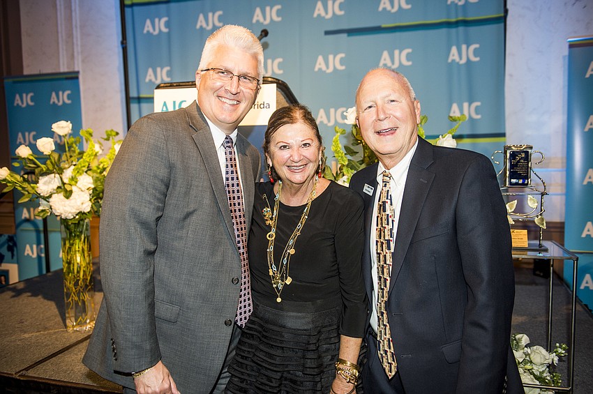 Michael Scott and Renee Hamad with birthday boy Scott Anderson