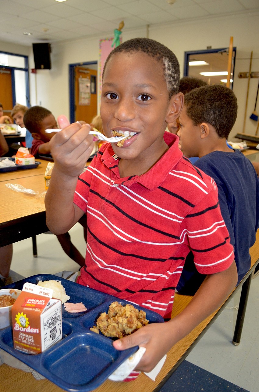 Kyree Clark, 11, munches on a heap of stuffing.