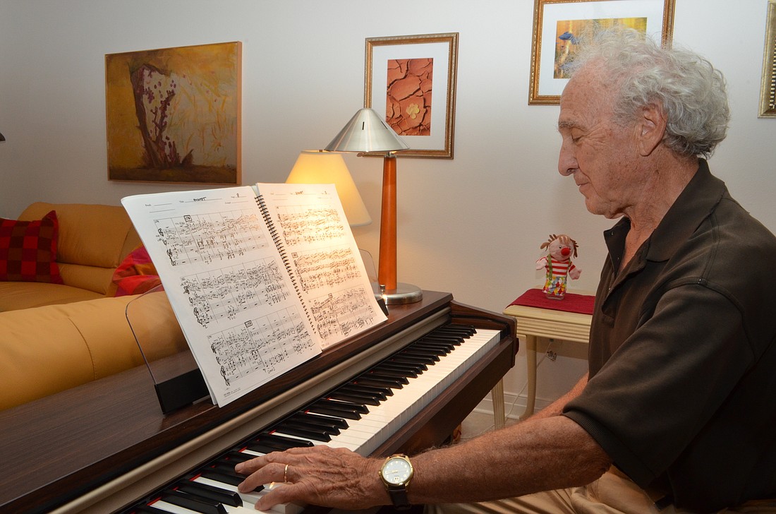 Jerry Bilik will spend hours writing and arranging scores at his keyboard piano in his and his wife Helga's living room in Pelican Cove.
