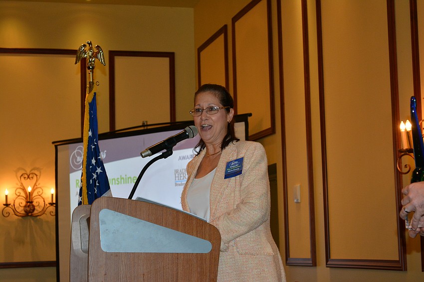 Ray of Sunshine winner Maria Hussey of Juvenile Diabetes Research Foundation shares a laugh with the crowd.