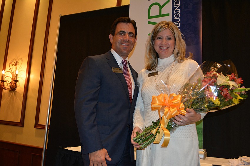 David Fink of Halliday Financial shares a moment with Lakewood Ranch Business Alliance Executive Director Heather Kasten.