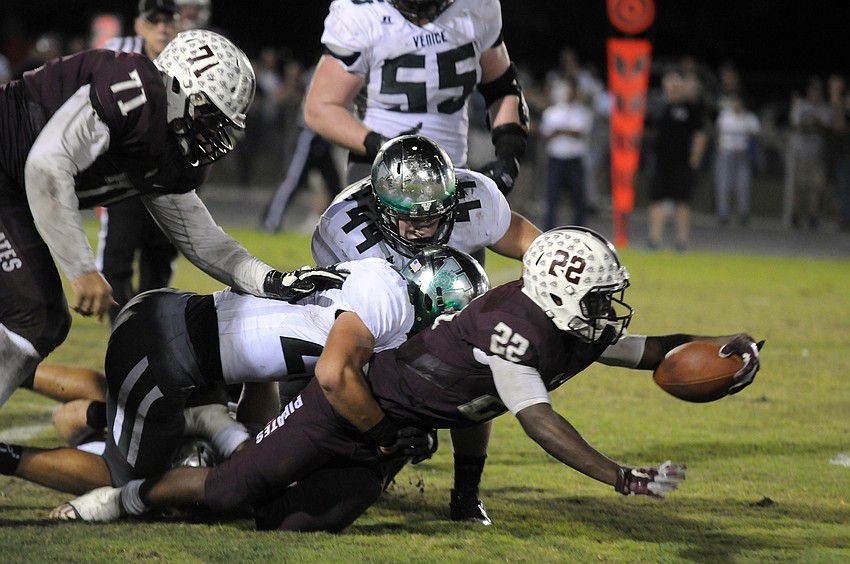 Braden River running back Dexter Hodo lunges for a first down in the second half.